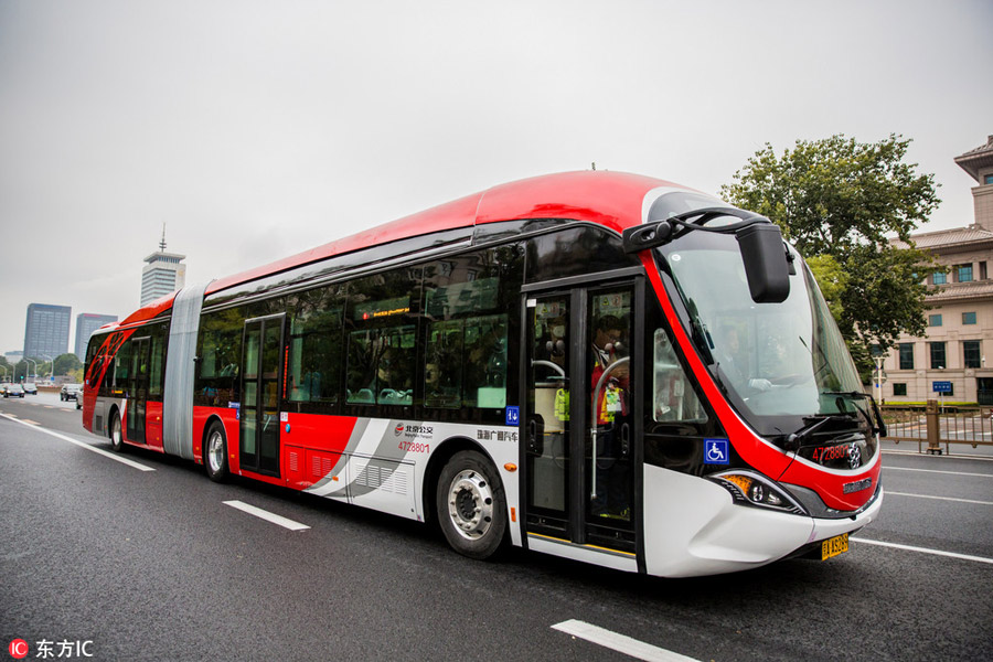 10 electric 'Chinese red' buses hit the roads in central Beijing.jpg